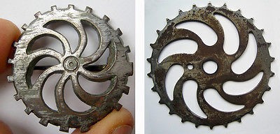 ancient-3rd-roman-cog-wheel-gear.jpg